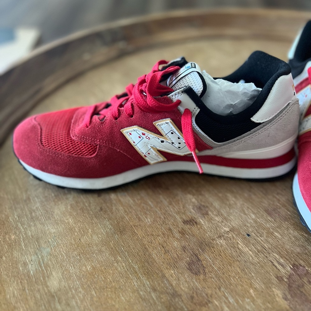 Men’s New Balance red Tennis shoes